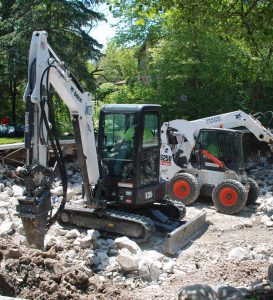 Mack Land Compact Excavator Landscape Architects Wauconda Denver Pool Removals
