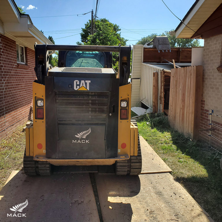 Mack Land Pool Removals Track Loader Tight Access